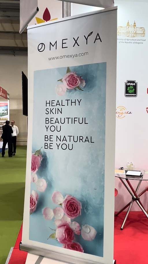 The OMEXYA banner at the exhibition in Athens.